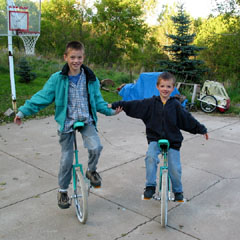boys on unicycles